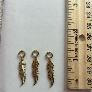 3 feather charms